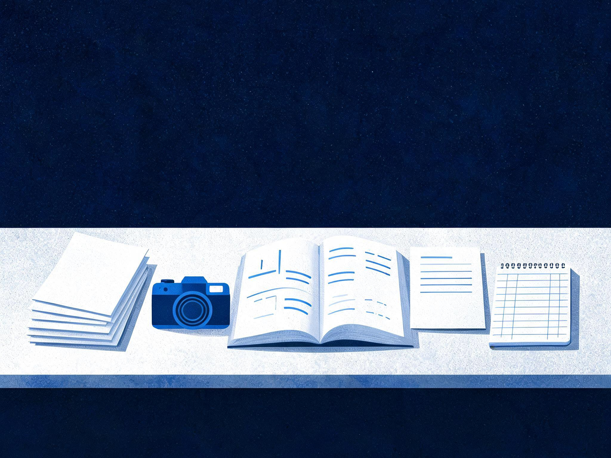 Cited — a worktable with a customer-question card stack, camera, edited buyer guide, email draft, and simple paper measurement ledger