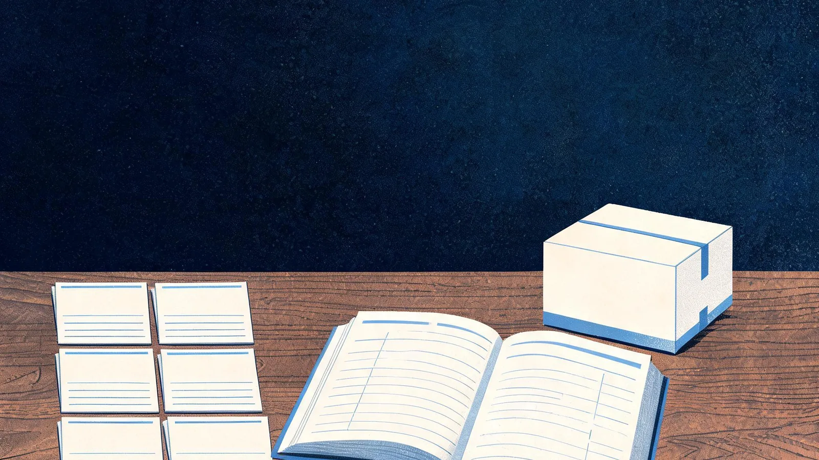 Cited — a small ecommerce workspace with an open notebook, product packaging, and neatly arranged content planning cards on a wooden desk